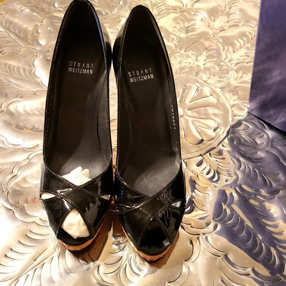 Expump black soft patent by Stuart Weitzman,  sz.7 med.